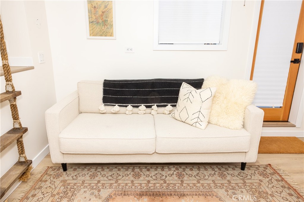 160 Avenida Florencia, Unit C San Clemente, CA 92672 - Photo 6 of 10 a bedroom with a bed and a window