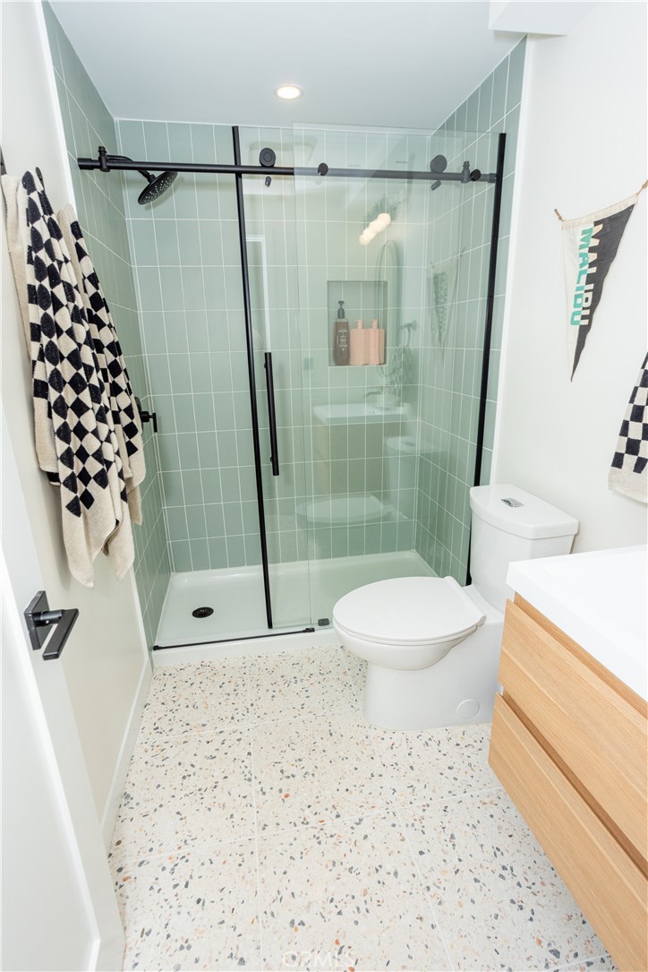 160 Avenida Florencia, Unit C San Clemente, CA 92672 - Photo 9 of 10 a bathroom with a sink toilet and shower