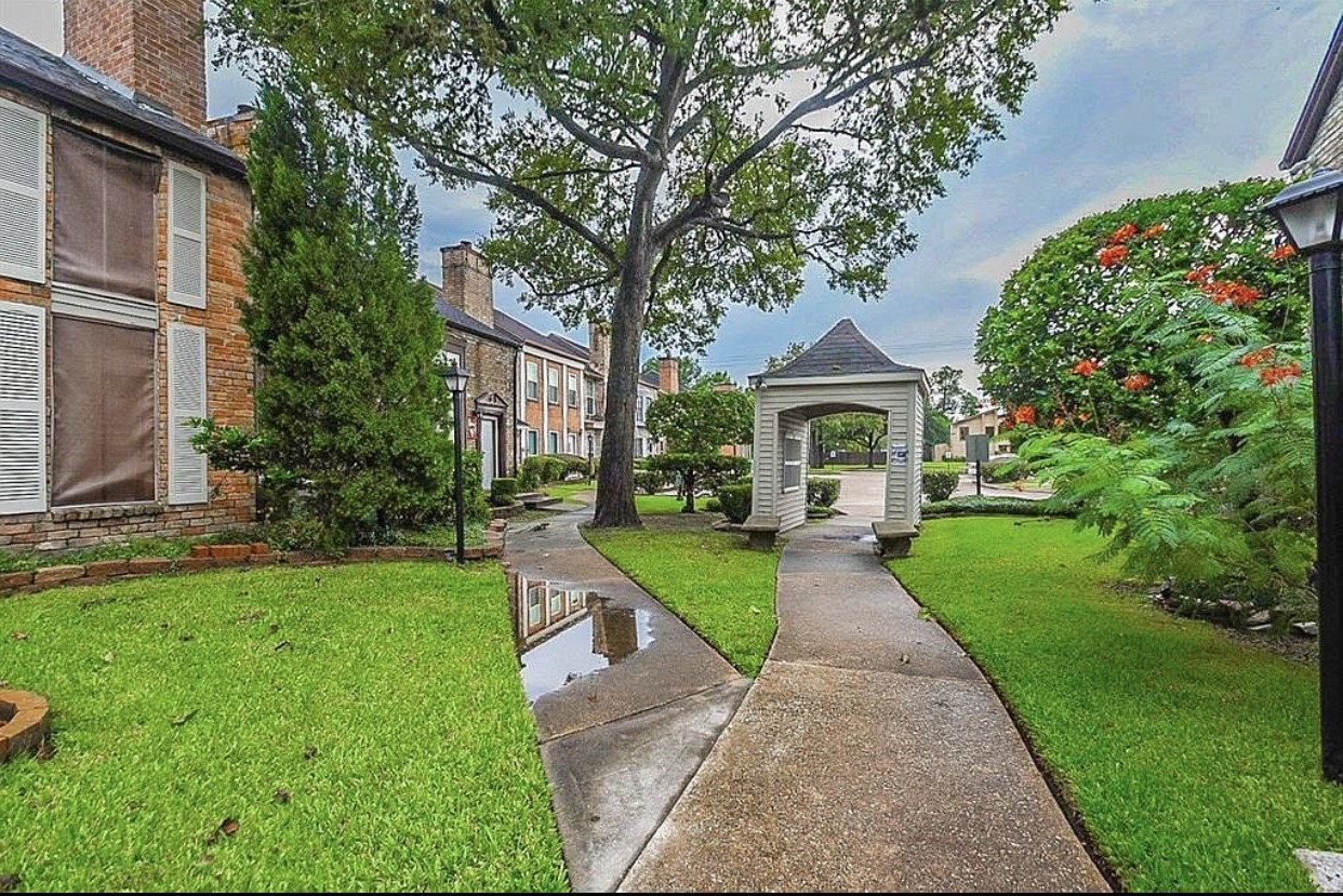 5100 Allendale Road, Unit 306 Houston, TX 77017 - Photo 2 of 13 a front view of a house with garden