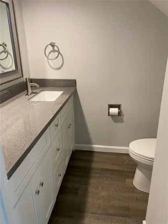 a bathroom with a sink and a toilet
