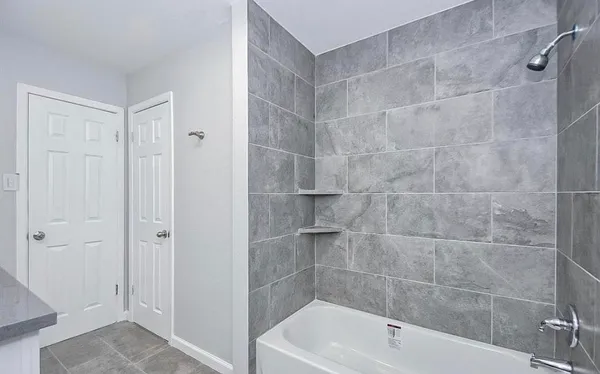 a bathroom with a bathtub