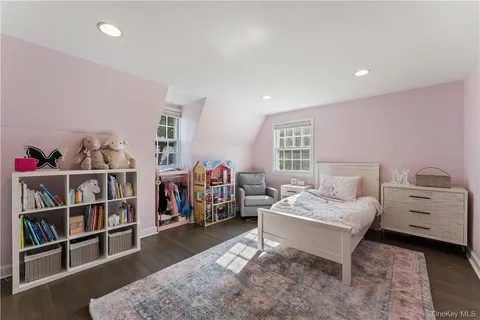 a bedroom with furniture and a bed