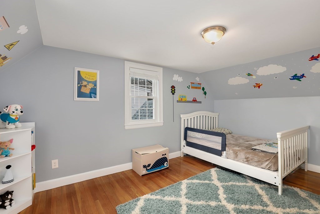 381 Appleton Street Arlington, MA 02476 - Photo 24 of 39 a bedroom with furniture and a window