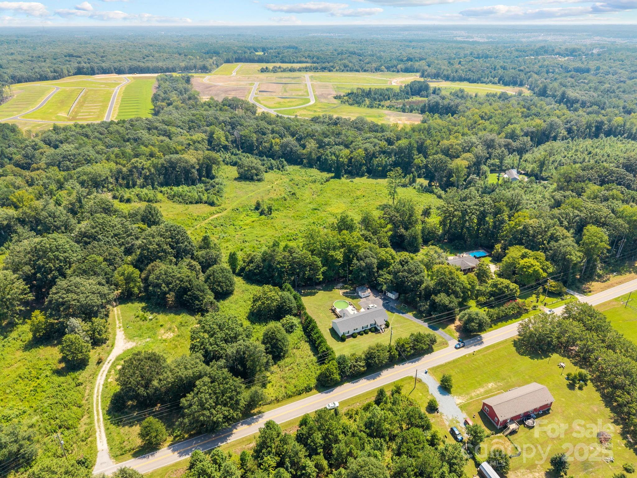 8168 Henry Harris Road, Unit 4 Fort Mill, SC 29707 - Photo 3 of 25 a view of a swimming pool and lake view