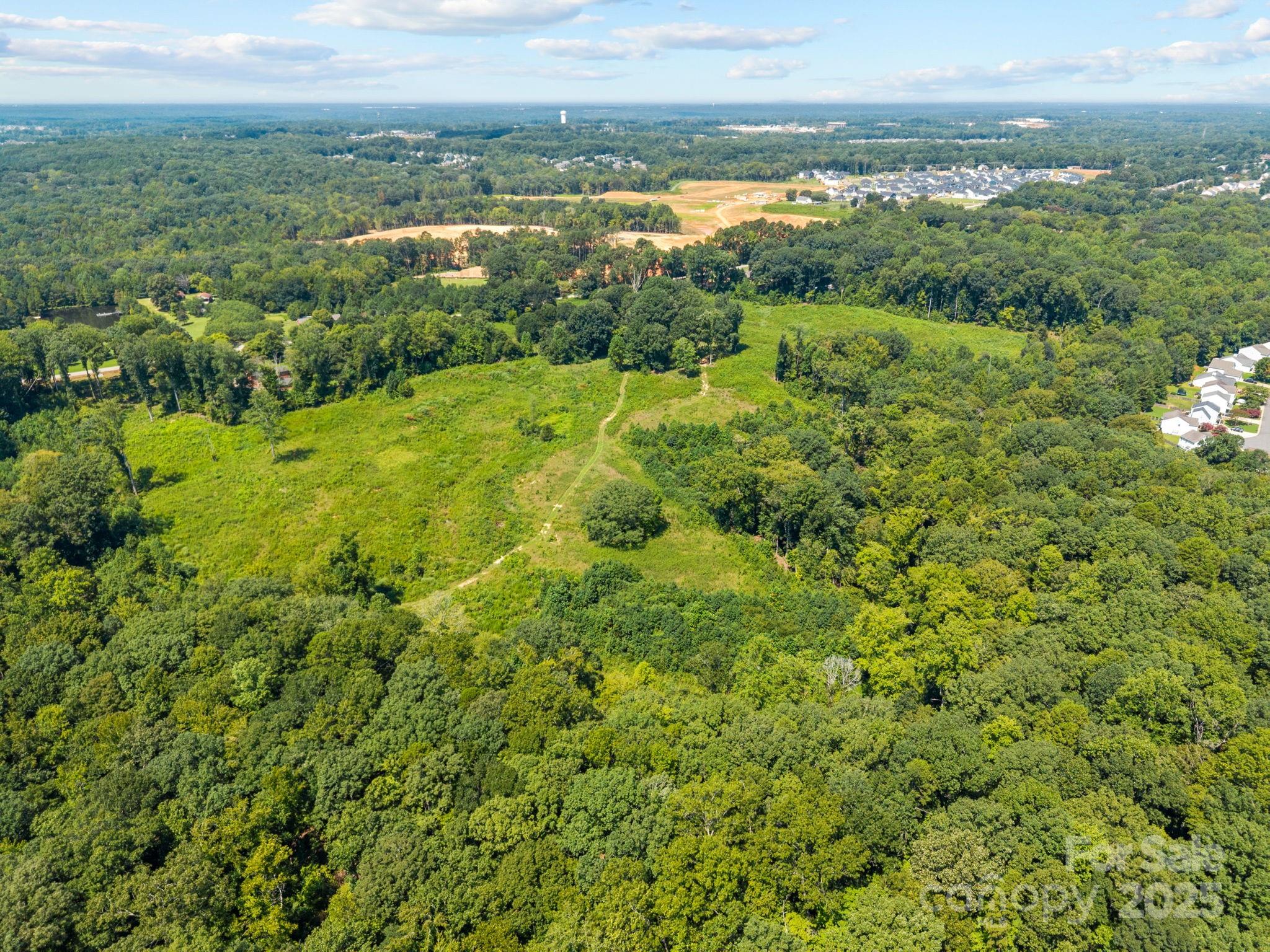 8168 Henry Harris Road, Unit 4 Fort Mill, SC 29707 - Photo 9 of 25 a view of a green field with an ocean view