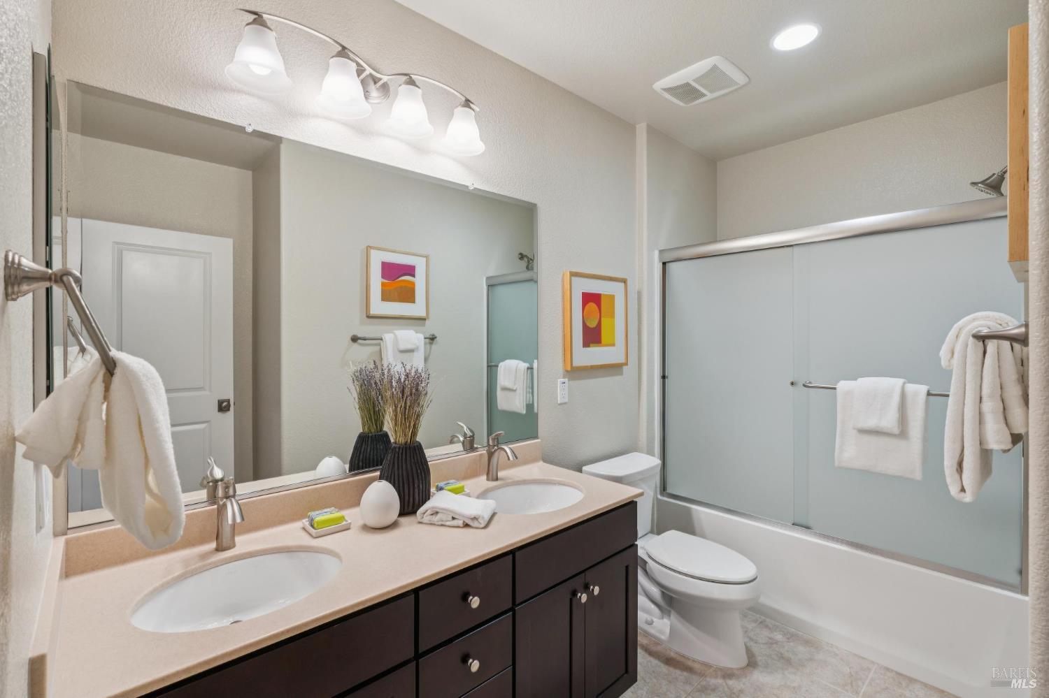 9 Edgehill Way San Rafael, CA 94903 - Photo 59 of 69 a bathroom with a granite countertop sink toilet and shower