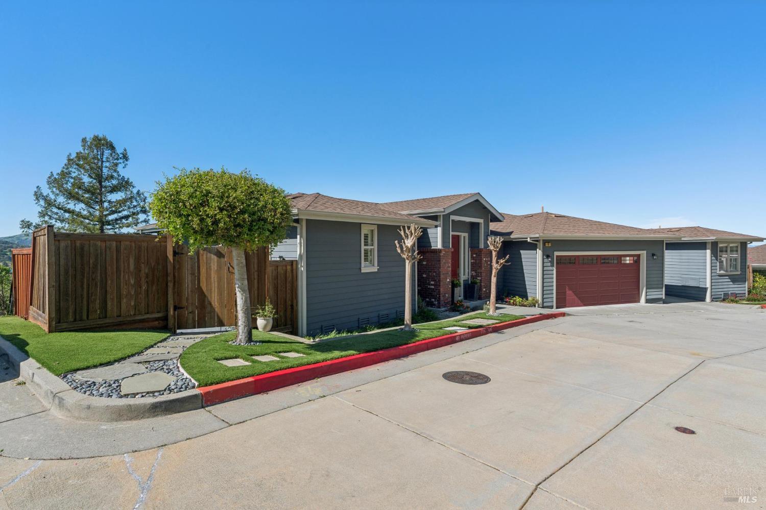 9 Edgehill Way San Rafael, CA 94903 - Photo 67 of 69 a front view of a house with a yard and garage