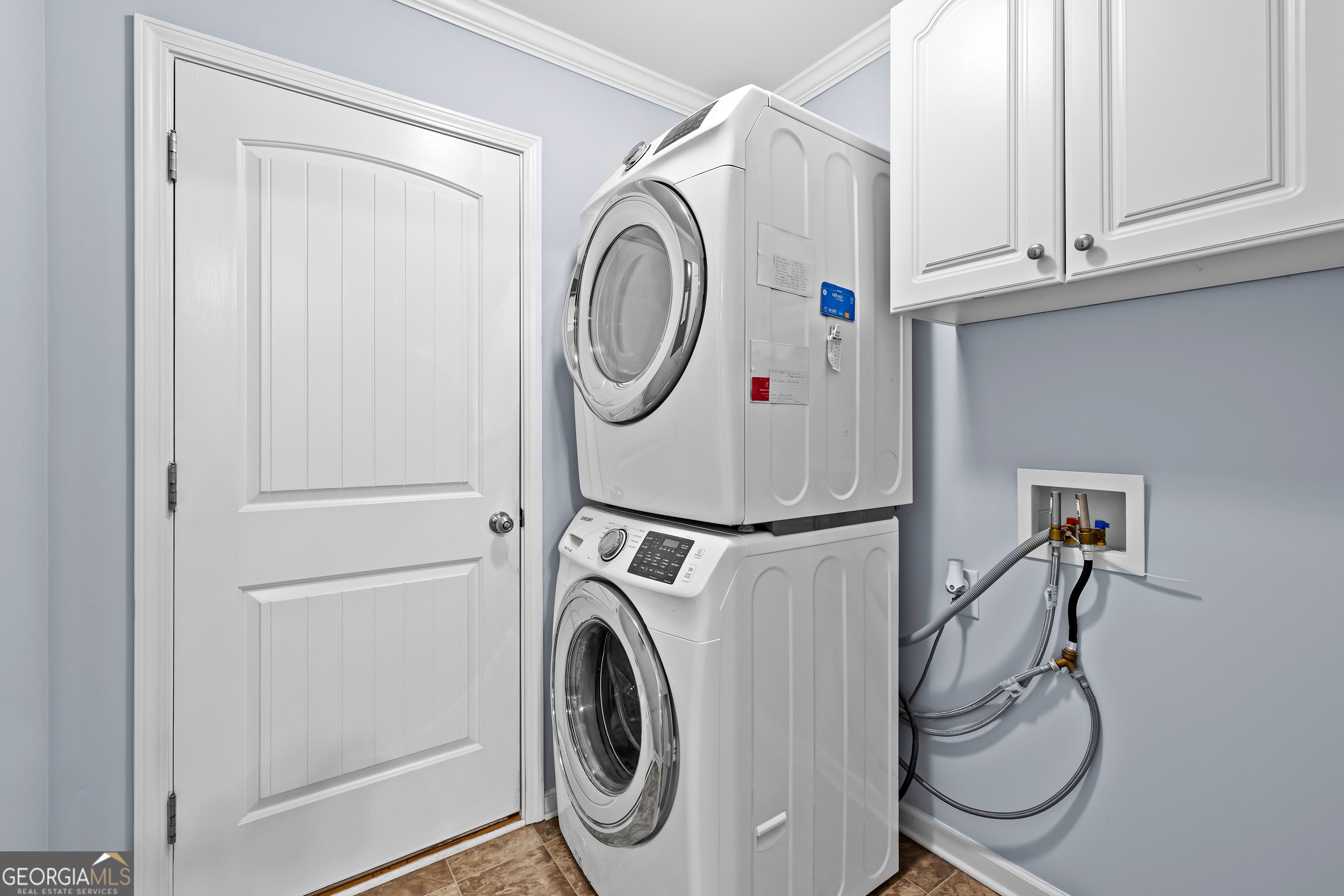4 Buttonbush Court Newnan, GA 30265 - Photo 17 of 40 a utility room with dryer and washer