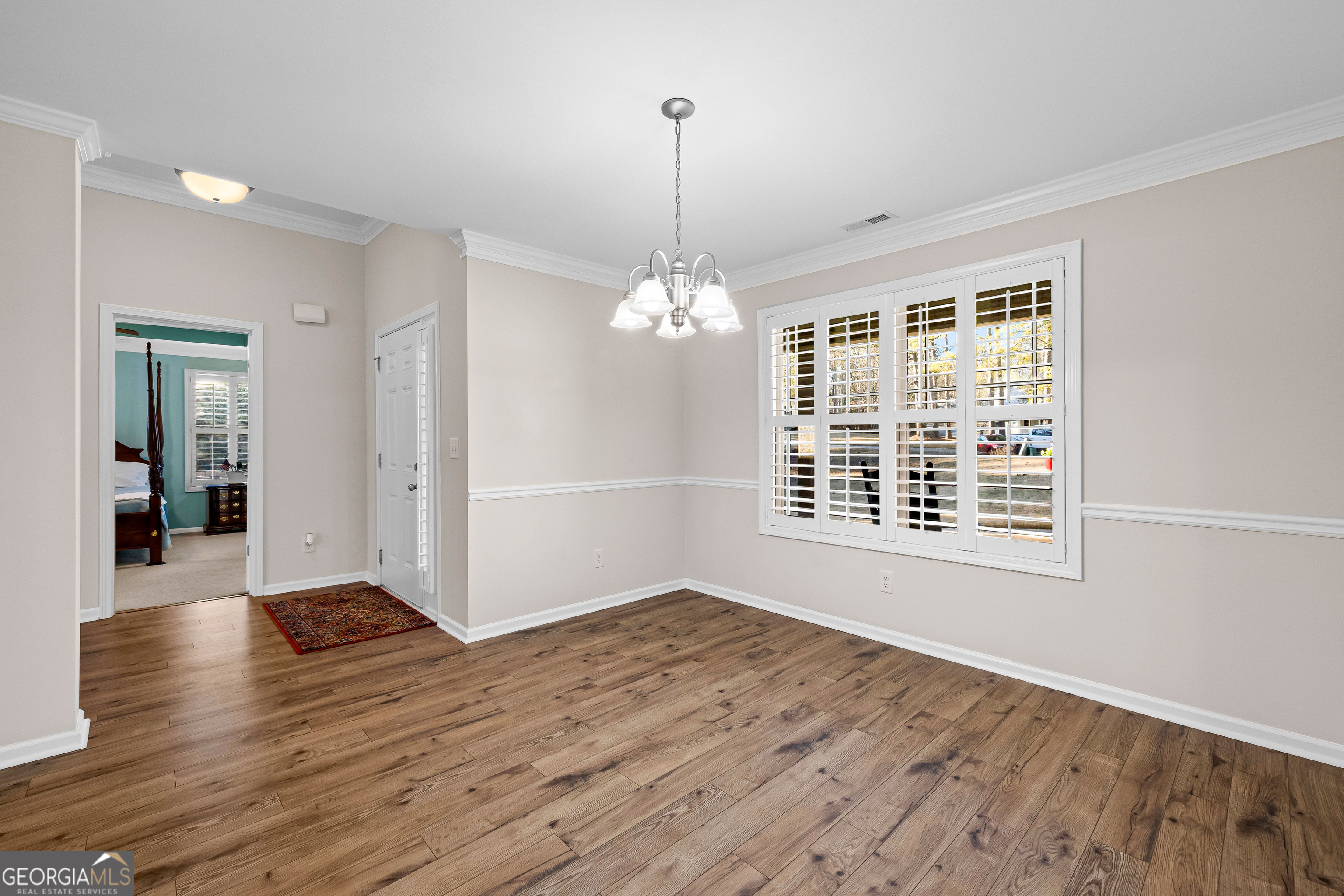 4 Buttonbush Court Newnan, GA 30265 - Photo 18 of 40 wooden floor in an empty room with a window