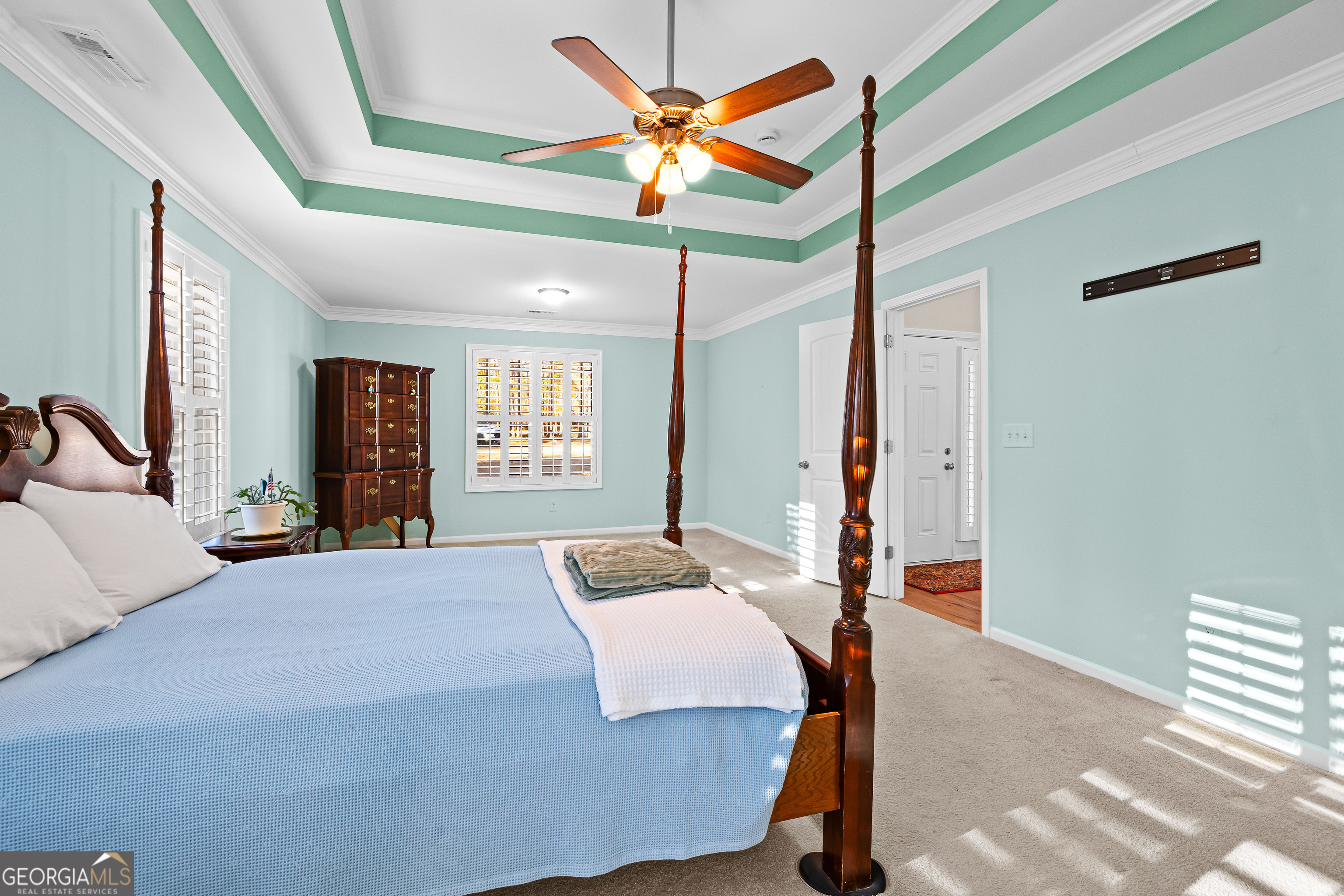 4 Buttonbush Court Newnan, GA 30265 - Photo 20 of 40 a bedroom with furniture and a large window