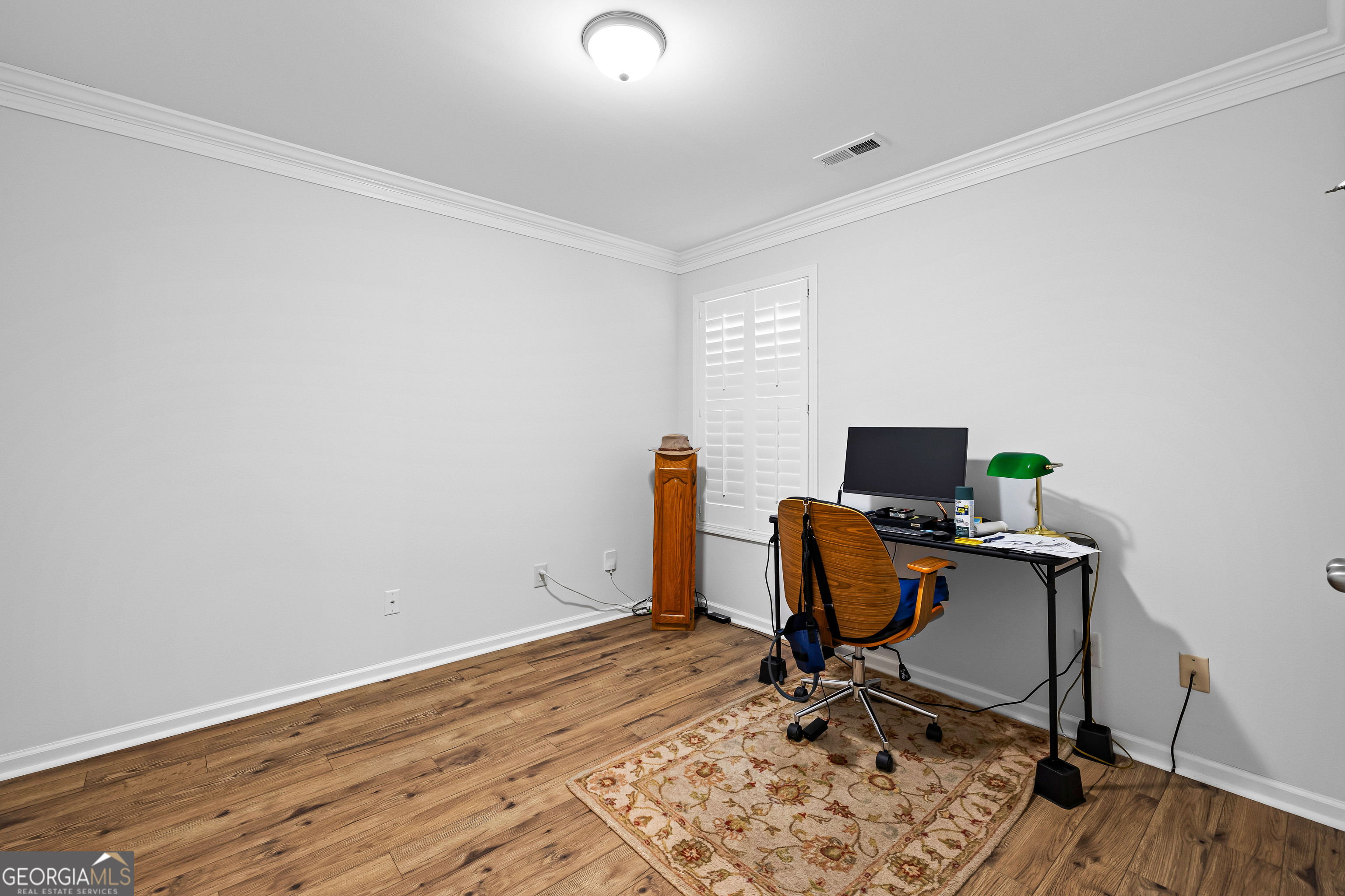 4 Buttonbush Court Newnan, GA 30265 - Photo 29 of 40 a view of workspace with wooden floor outdoor space