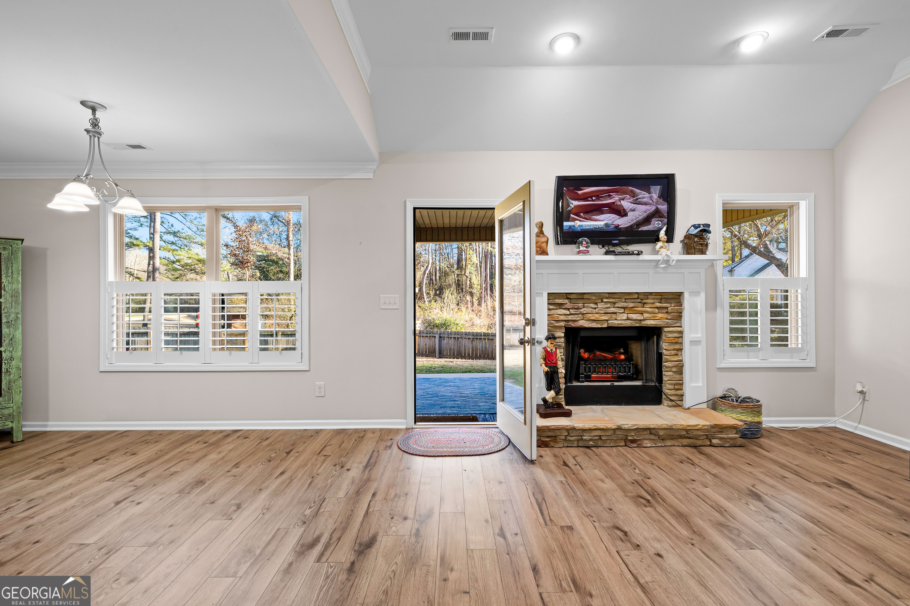 4 Buttonbush Court Newnan, GA 30265 - Photo 35 of 40 a view of an empty room with a window and fireplace