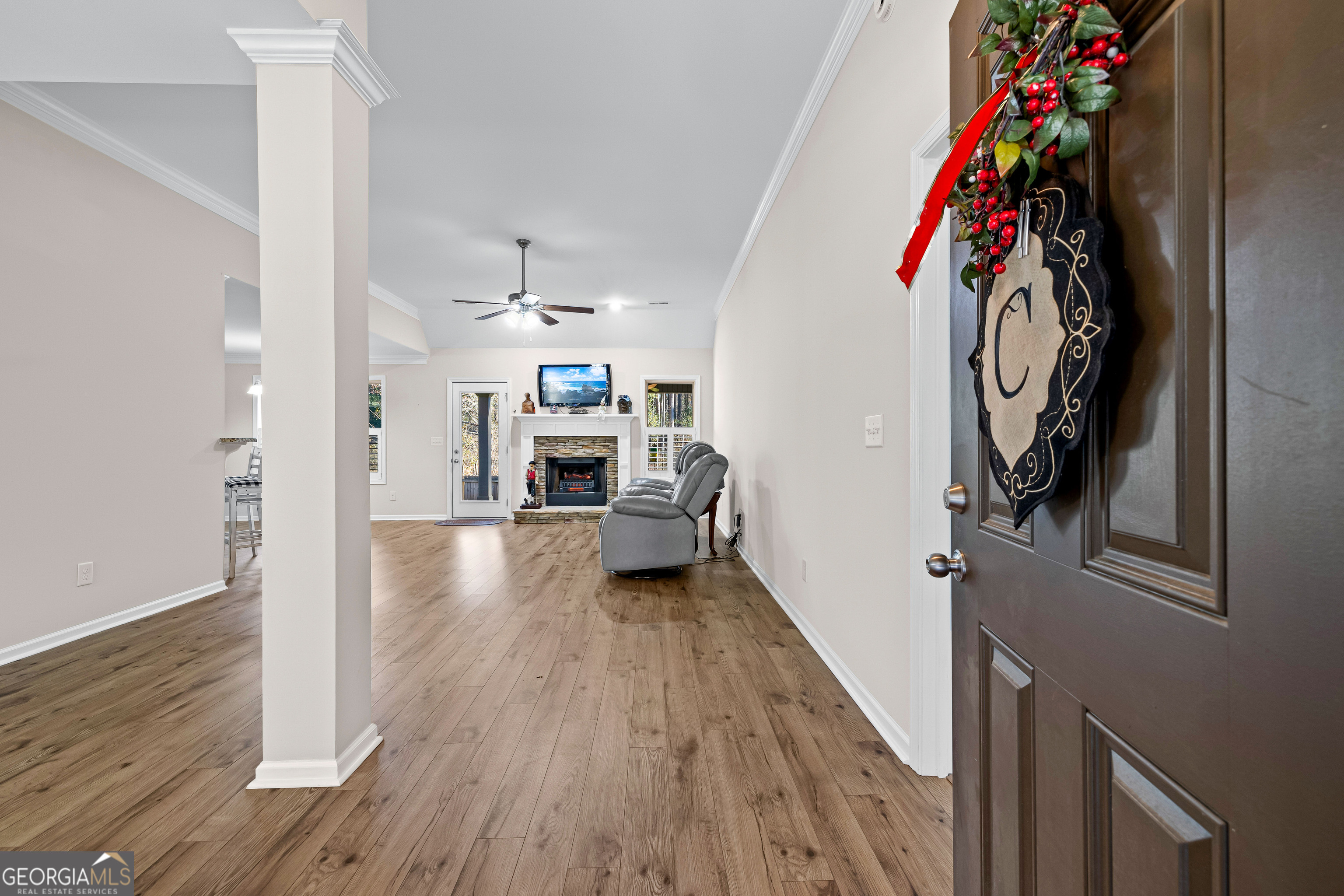 4 Buttonbush Court Newnan, GA 30265 - Photo 6 of 40 a view of livingroom with furniture and wooden floor