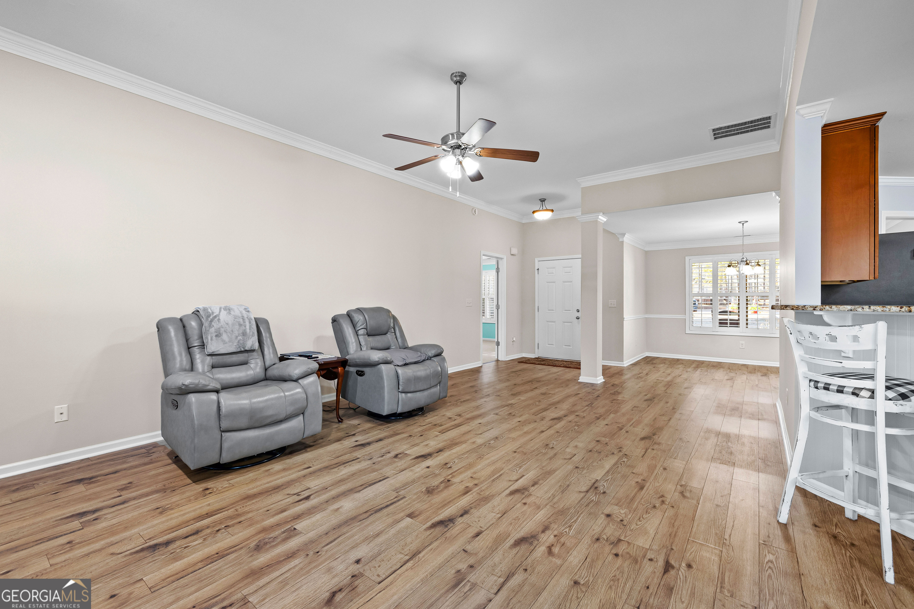 4 Buttonbush Court Newnan, GA 30265 - Photo 10 of 40 a living room with furniture and a wooden floor