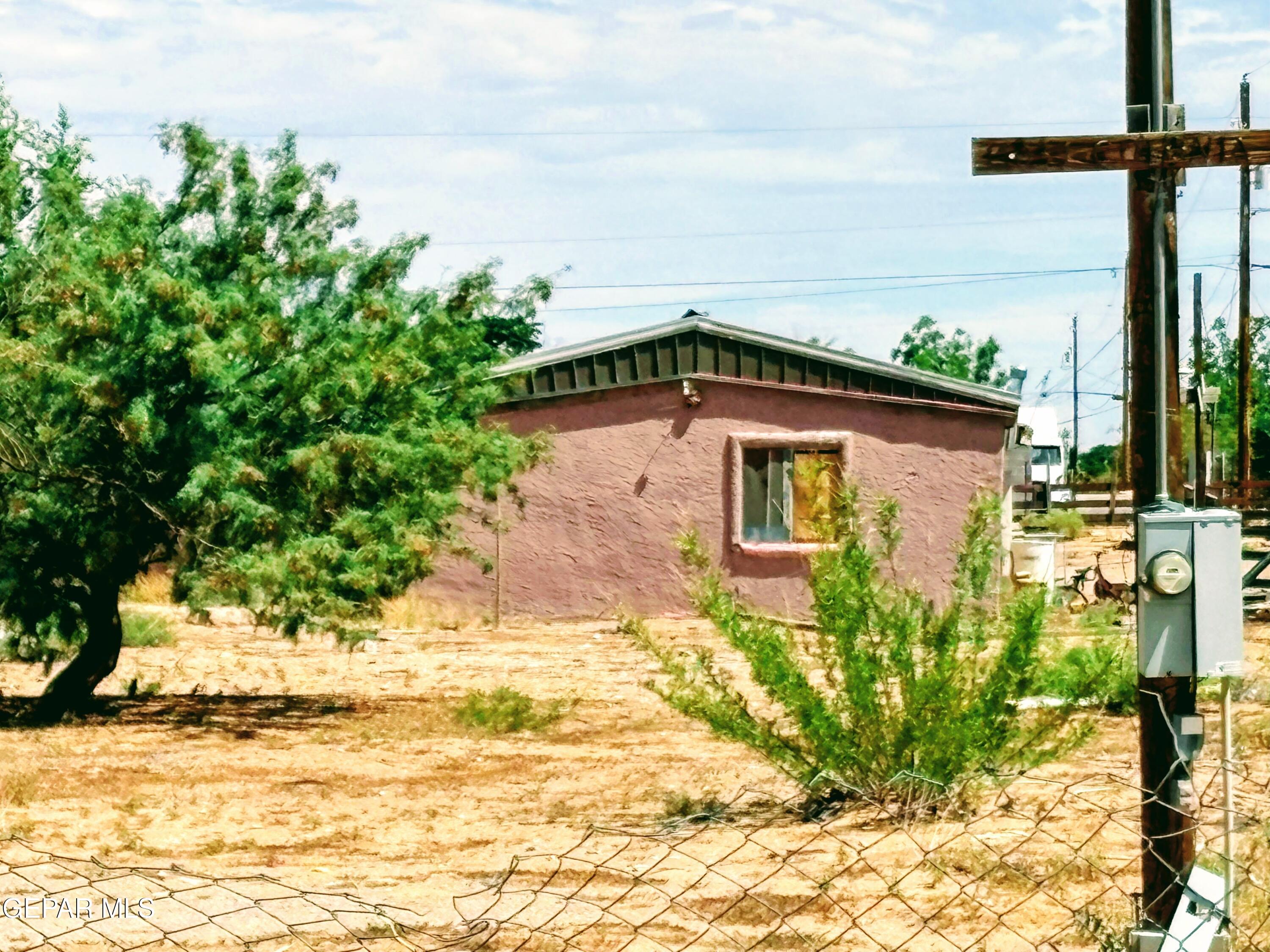15031 Colonia Campo Road El Paso, TX 79928 - Photo 11 of 11 a front view of a house with a yard