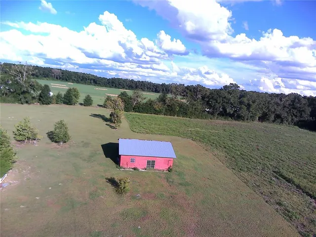 a view of a golf course with a lake