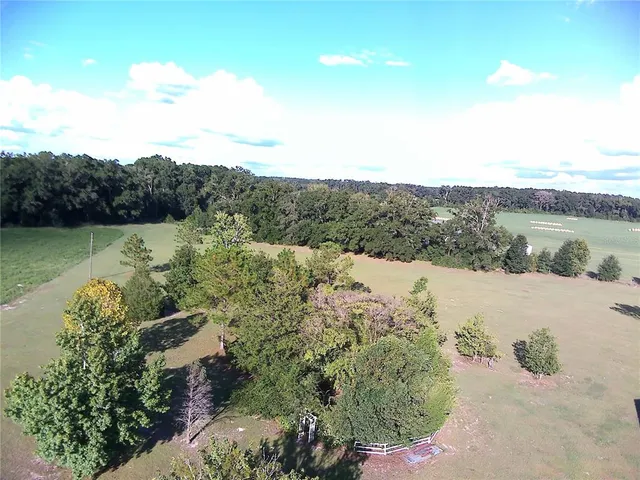 a view of a golf course with a lake