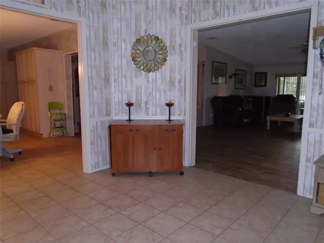 a view of a chairs and table in the patio