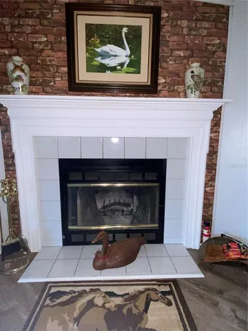 a fireplace with a clock on top of it