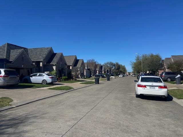 13343 South Point Lane Houston, TX 77034 - Photo 12 of 13 a car parked on the side of the road