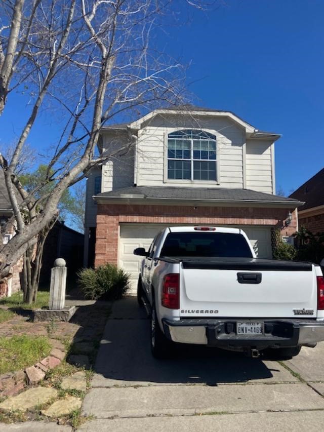 13343 South Point Lane Houston, TX 77034 - Photo 13 of 13 a car parked in front of a building