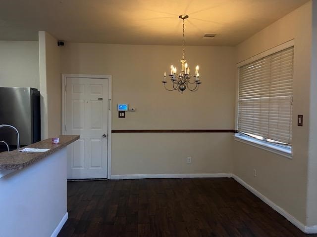 13343 South Point Lane Houston, TX 77034 - Photo 7 of 13 a view of a livingroom with a furniture wooden floor and chandelier