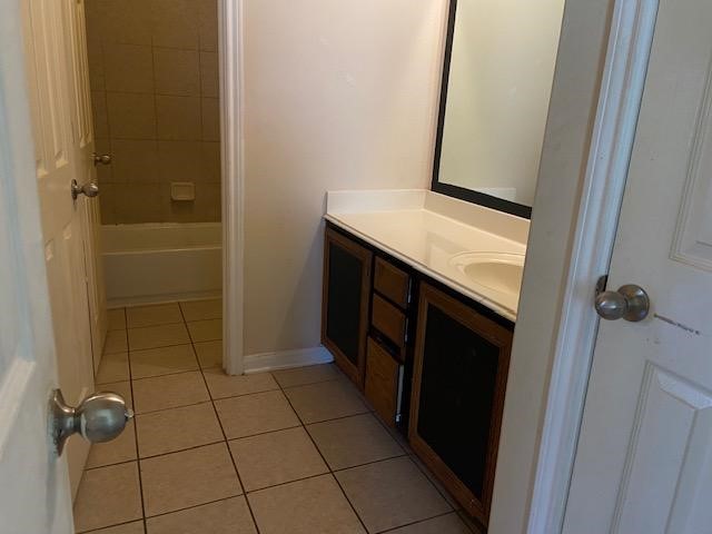 13343 South Point Lane Houston, TX 77034 - Photo 9 of 13 a bathroom with a sink a toilet and a mirror