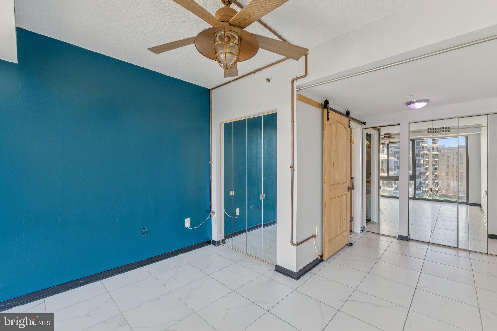 1530 Key Boulevard, Unit 929 Arlington, VA 22209 - Photo 20 of 37 a view of a hallway with closet