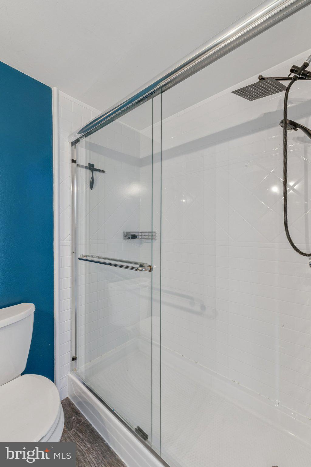 1530 Key Boulevard, Unit 929 Arlington, VA 22209 - Photo 25 of 37 a bathroom with a toilet and a shower