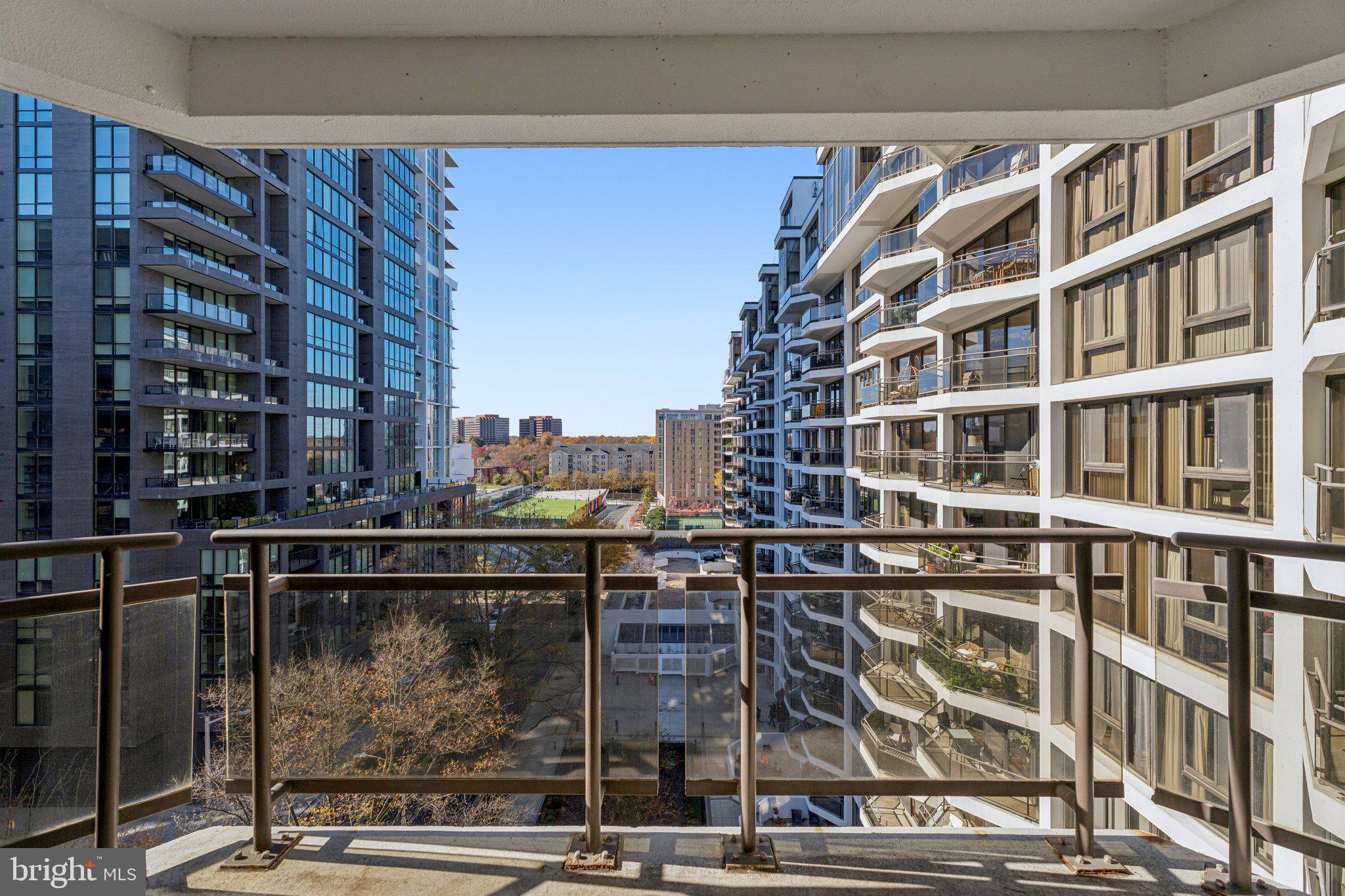 1530 Key Boulevard, Unit 929 Arlington, VA 22209 - Photo 28 of 37 a picture of a glass door with a city view
