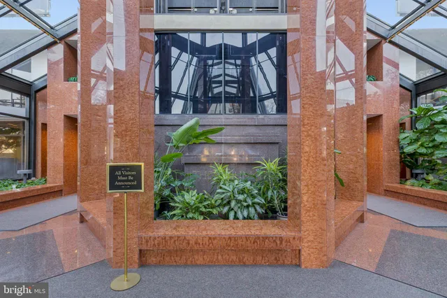 a view of a house with a tree