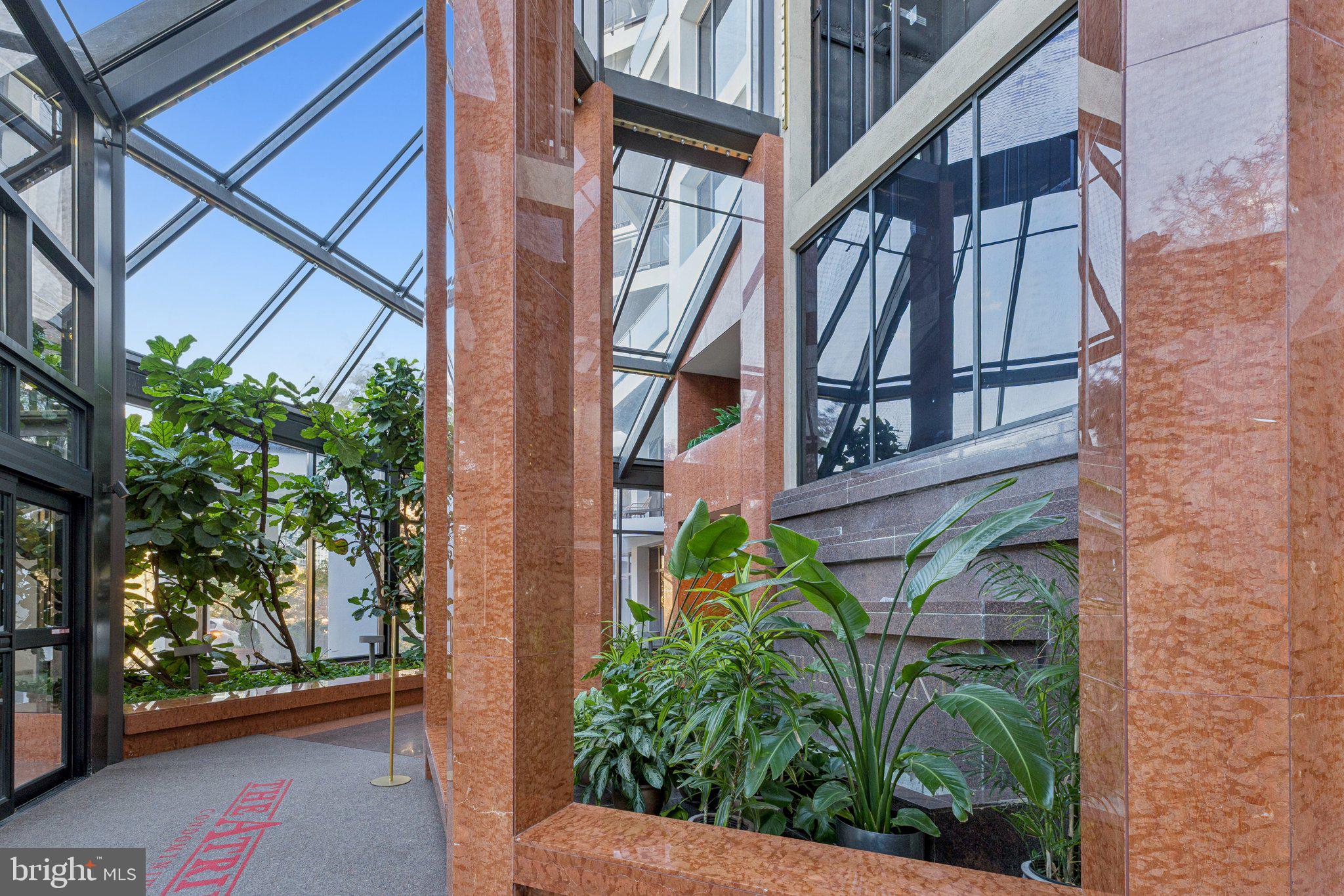 1530 Key Boulevard, Unit 929 Arlington, VA 22209 - Photo 36 of 37 a view of a house with a tree