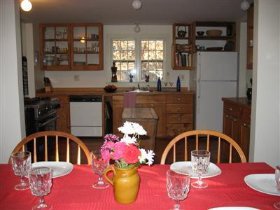 4 Lesser Lane Truro, MA 02666 - Photo 8 of 15 a kitchen with a sink appliances and cabinets