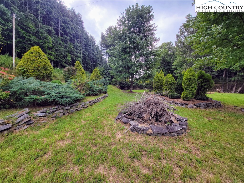 West Mill Creek Road Warrensville, NC 28693 - Photo 11 of 13 a big yard with lots of green space