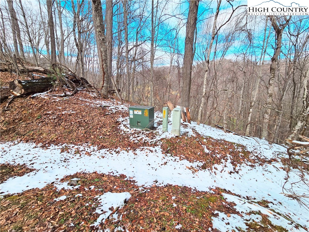 West Mill Creek Road Warrensville, NC 28693 - Photo 2 of 13 a view of a yard with wooden fence