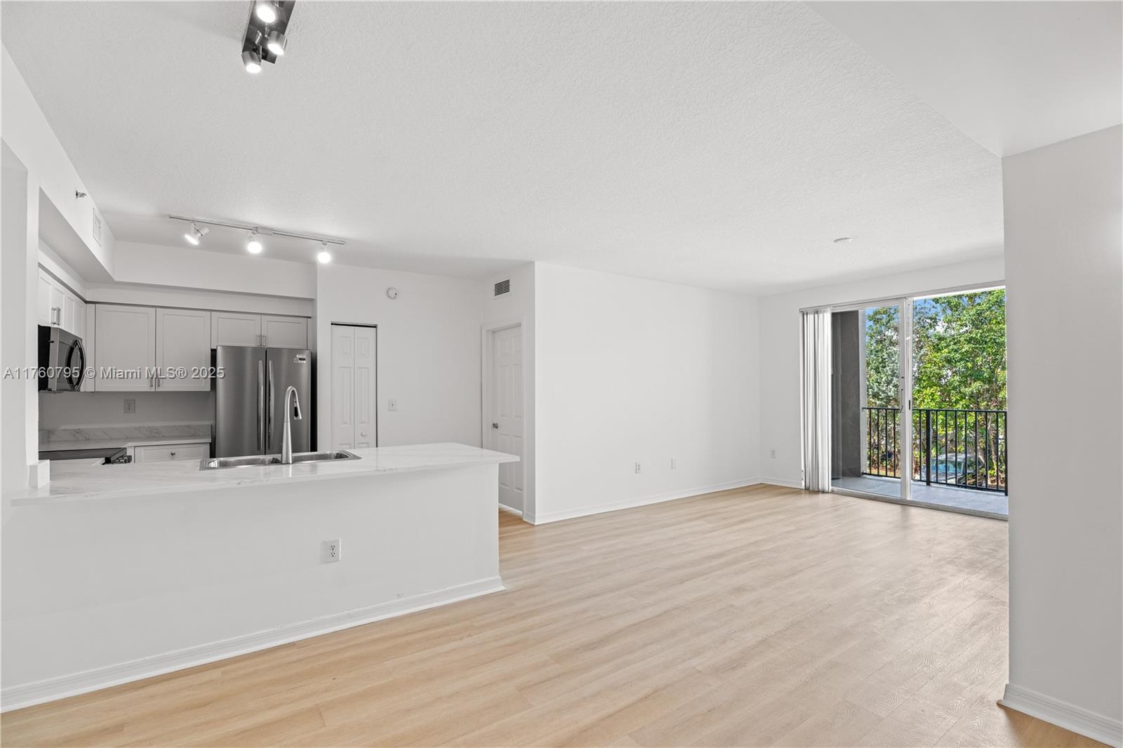 6851 Southwest 44th Street, Unit 107 Miami, FL 33155 - Photo 7 of 26 Images reflect a similar upgraded unit. Finishes are the same, but appliances may vary.