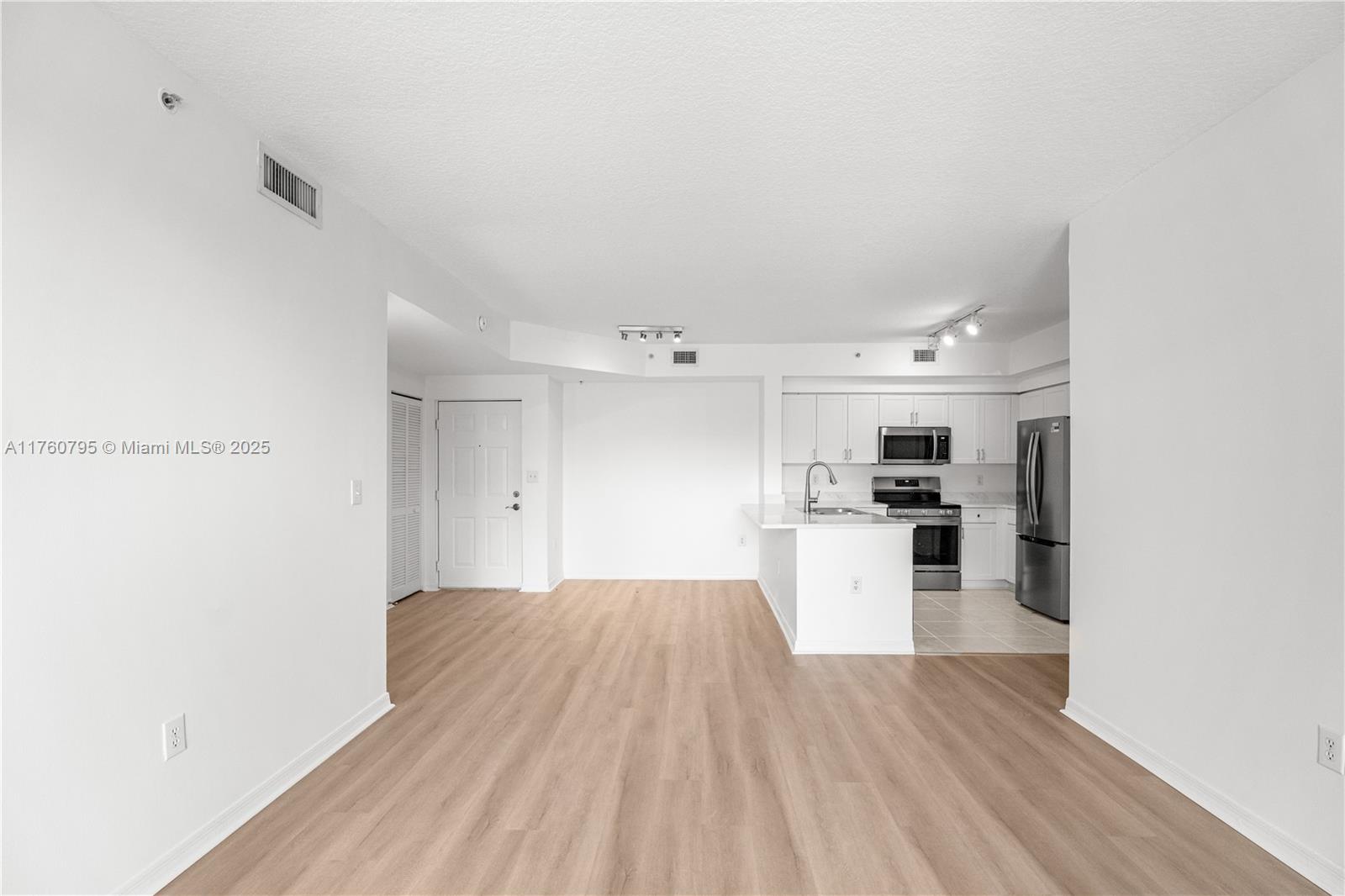 6851 Southwest 44th Street, Unit 107 Miami, FL 33155 - Photo 8 of 26 Images reflect a similar upgraded unit. Finishes are the same, but appliances may vary.