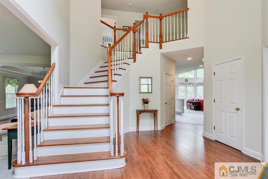 76 Bennett Road Old Bridge, NJ 07747 - Photo 2 of 23 a view of staircase with white walls and window