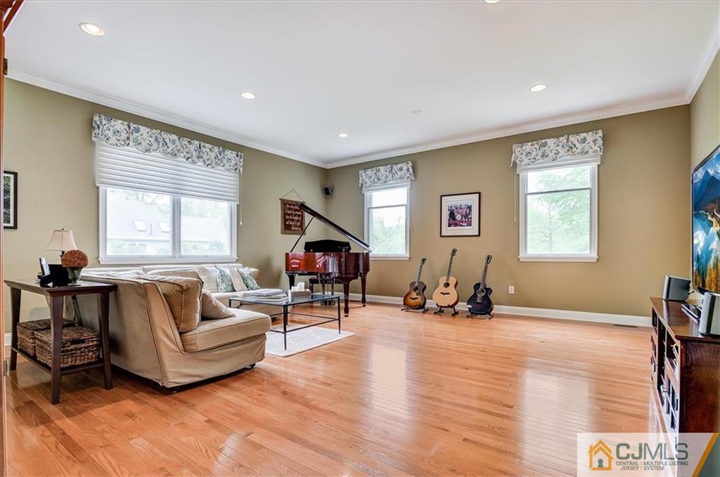 76 Bennett Road Old Bridge, NJ 07747 - Photo 13 of 23 a living room with furniture and a wooden floor