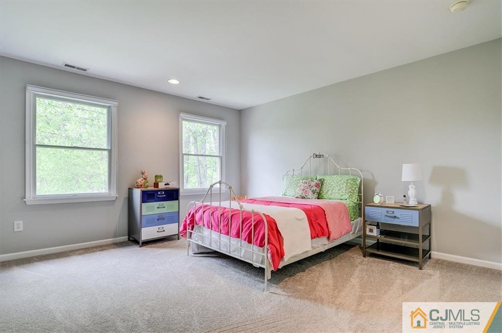 76 Bennett Road Old Bridge, NJ 07747 - Photo 20 of 23 a bed room with a bed and a window