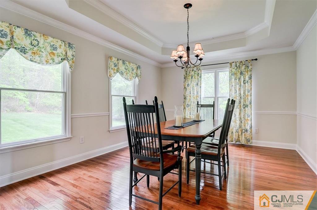 76 Bennett Road Old Bridge, NJ 07747 - Photo 5 of 23 a view of a dining room with furniture window and wooden floor
