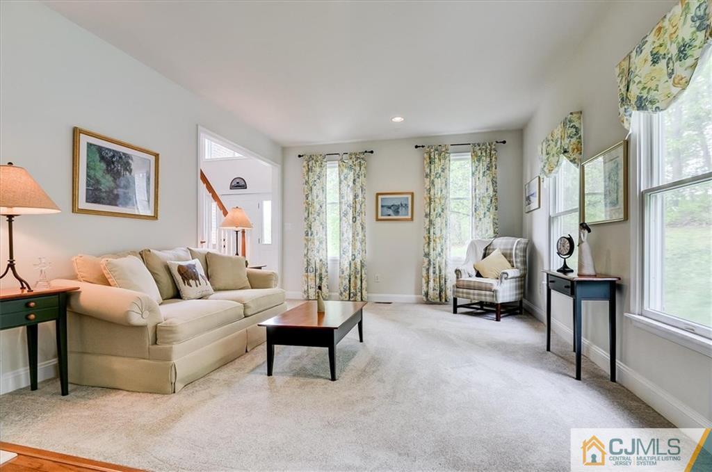 76 Bennett Road Old Bridge, NJ 07747 - Photo 6 of 23 a living room with furniture and a large window