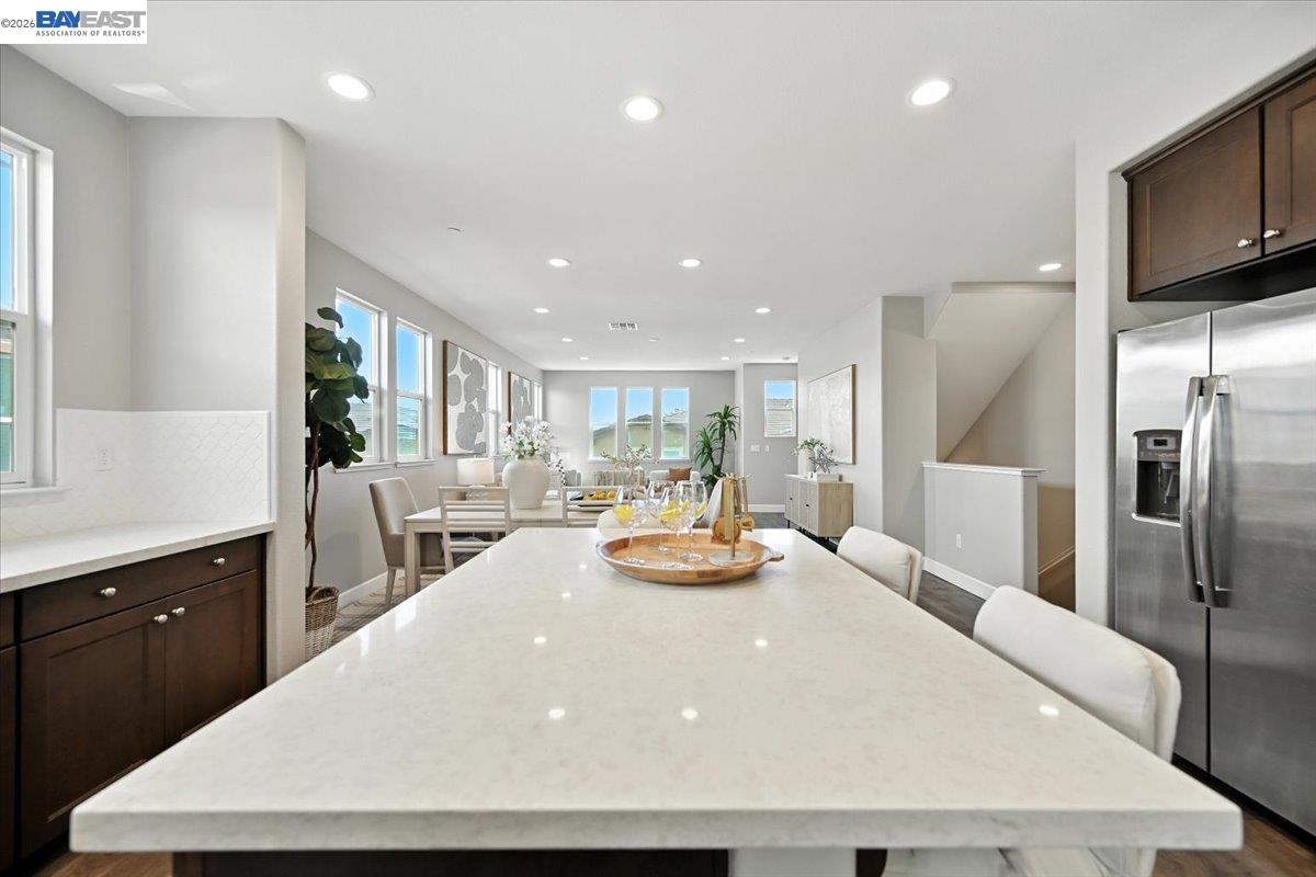 437 Ryan Terrace San Ramon, CA 94583 - Photo 12 of 30 a large kitchen with sink a refrigerator and wooden floor