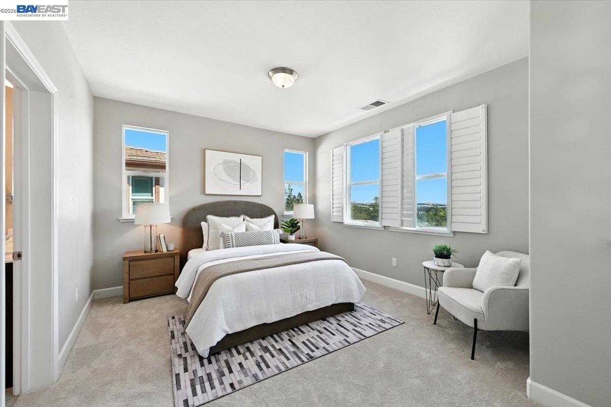 437 Ryan Terrace San Ramon, CA 94583 - Photo 15 of 30 a spacious bedroom with a bed and a large window