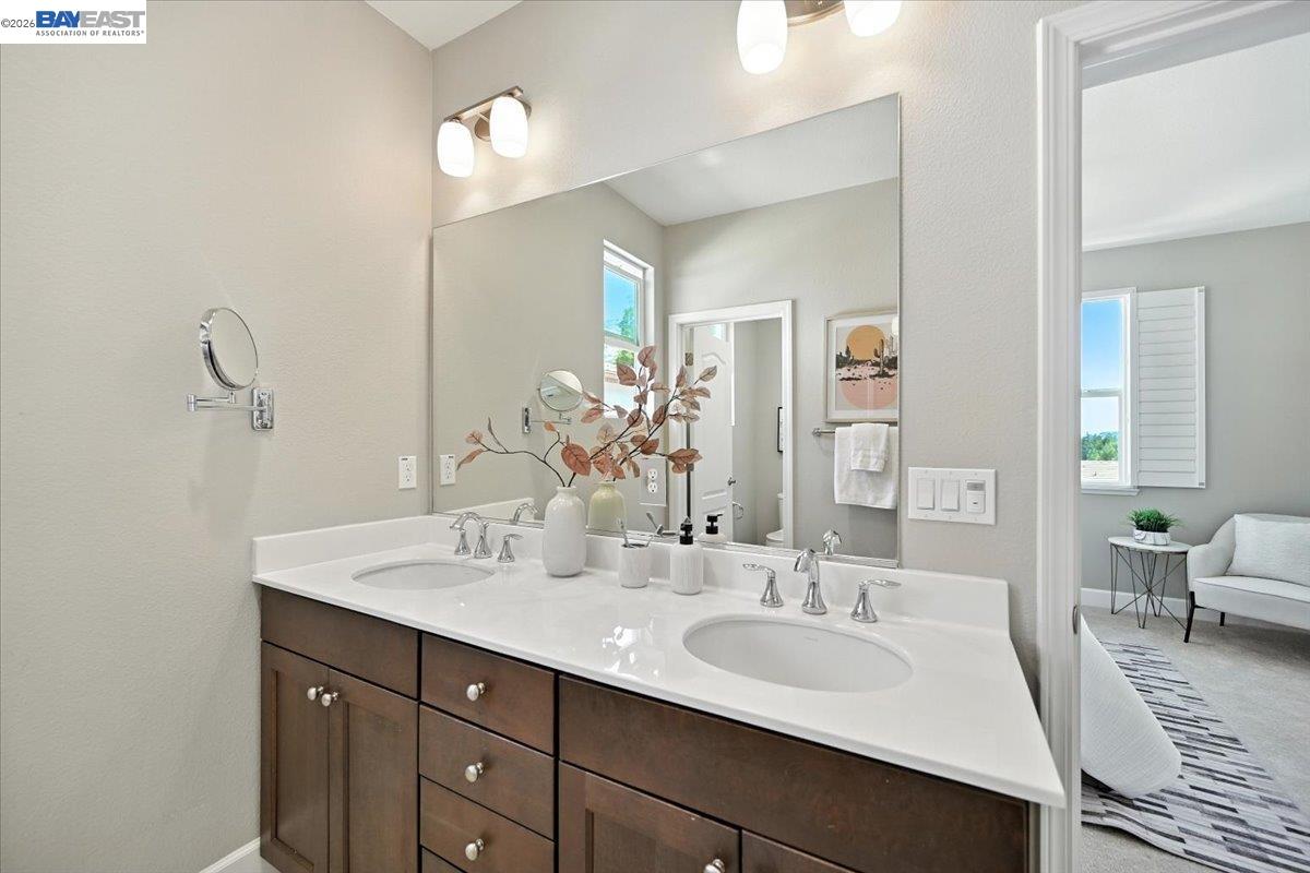 437 Ryan Terrace San Ramon, CA 94583 - Photo 19 of 30 a bathroom with a sink double vanity and a mirror