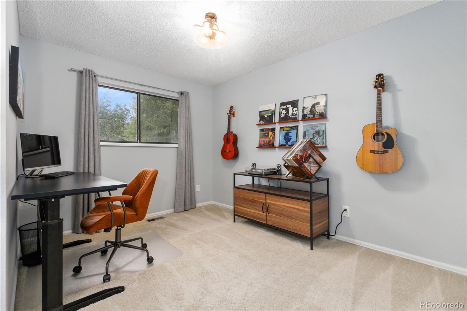 11841 West Dumbarton Drive Morrison, CO 80465 - Photo 23 of 45 a room with furniture and a window