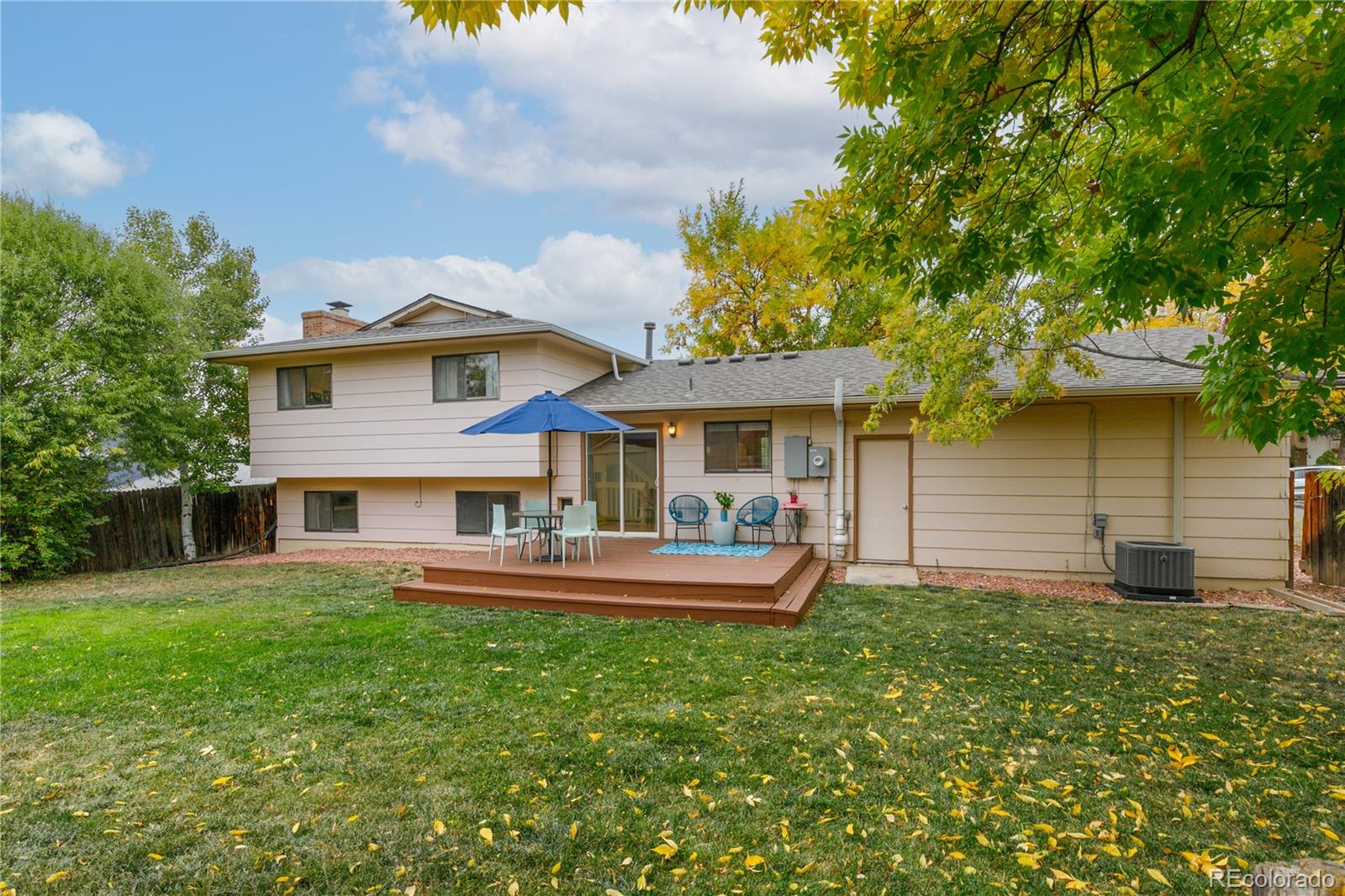 11841 West Dumbarton Drive Morrison, CO 80465 - Photo 28 of 45 a front view of house with yard and trees