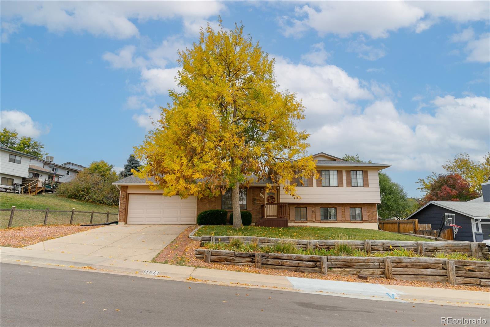 11841 West Dumbarton Drive Morrison, CO 80465 - Photo 3 of 45 a view of a street in front of a building