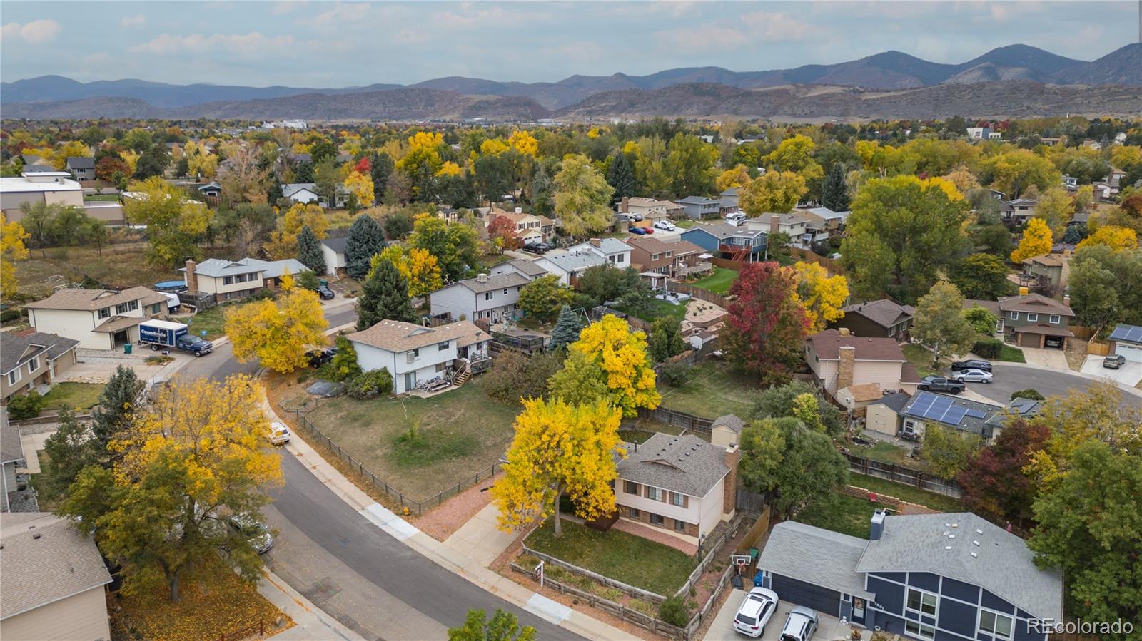 11841 West Dumbarton Drive Morrison, CO 80465 - Photo 32 of 45 a view of a city with mountains in the background