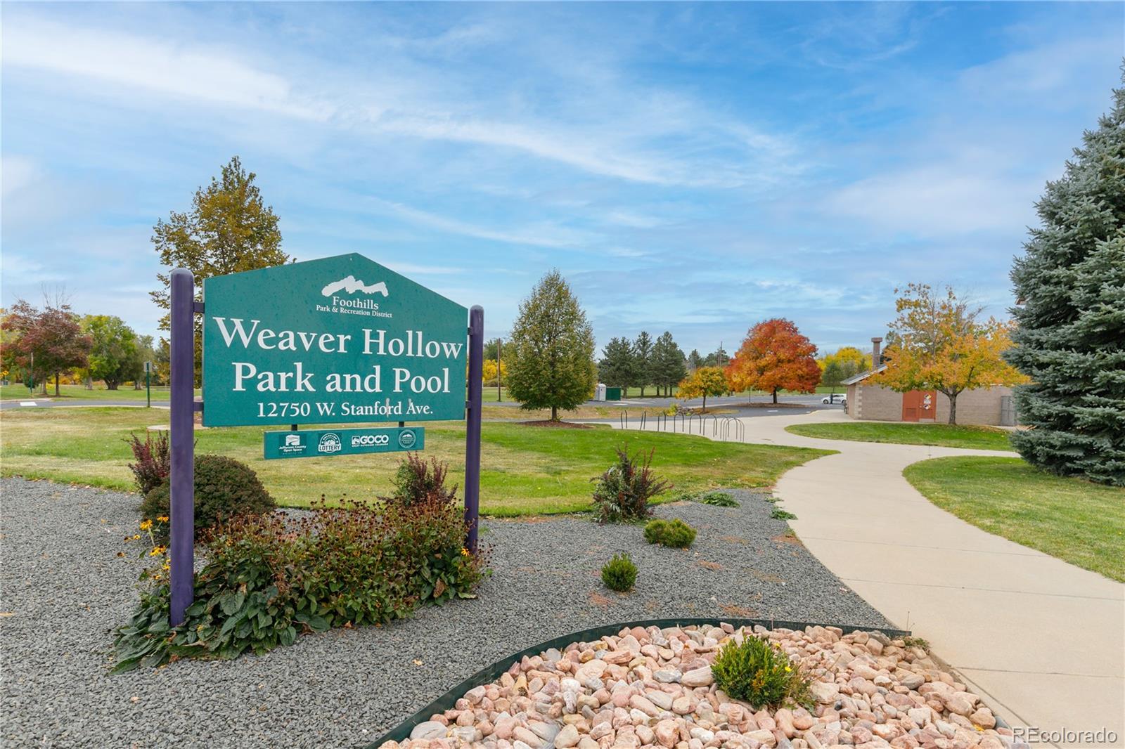 11841 West Dumbarton Drive Morrison, CO 80465 - Photo 38 of 45 a sign board with a big yard